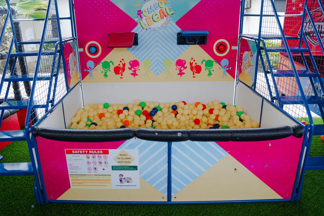 A colourful ball pit inside the covered play structure