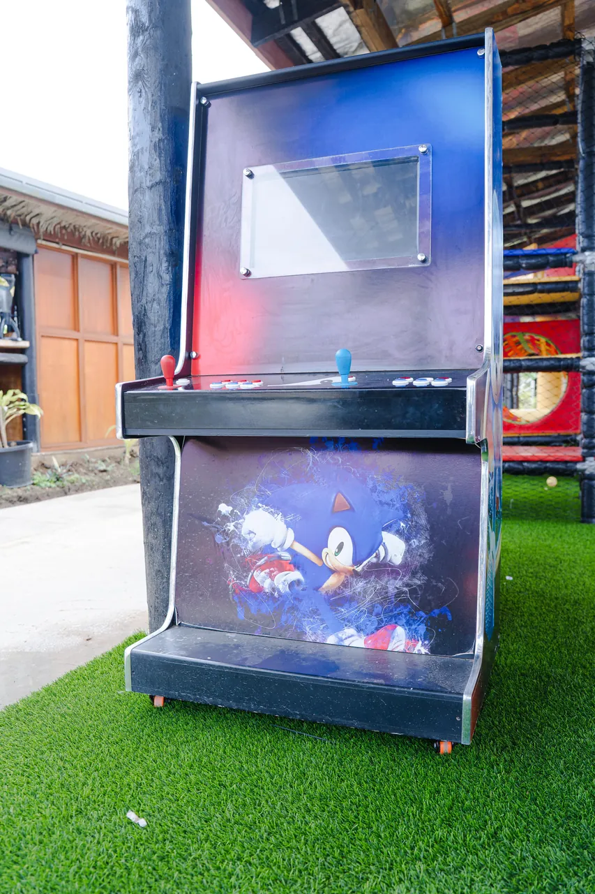 A games cabinet beside the covered Playland