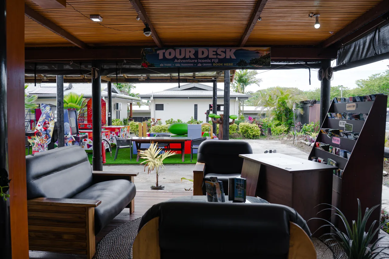 Timber seating and the tour desk in the open reception lounge