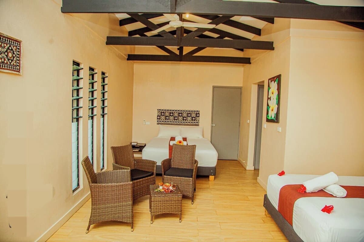 Deluxe Villa — the separate bedroom with twin and queen beds