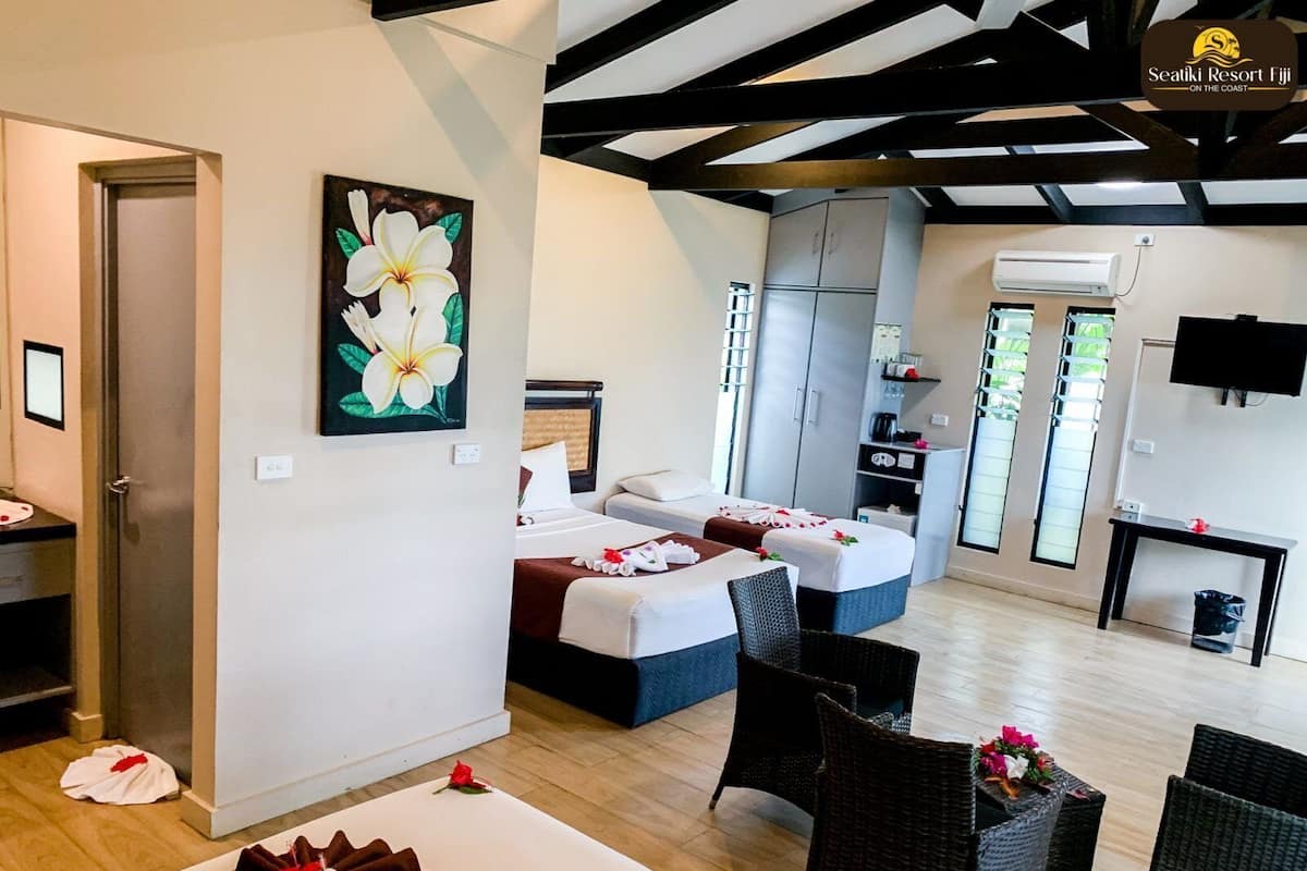 Deluxe Villa — the patio opening onto the garden